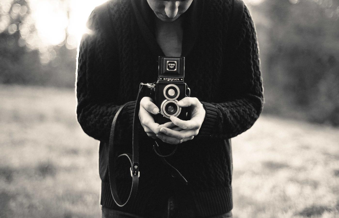 Team reviewing X analytics dashboard and monthly trend reports